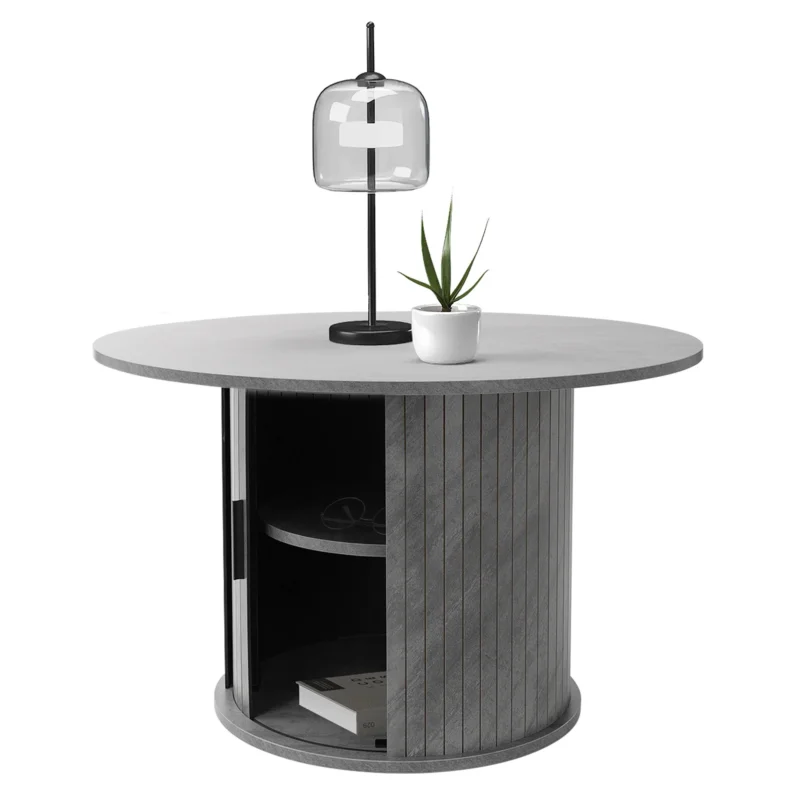 Grauer runder Tisch mit Lampe, Pflanze und offenem Fach.